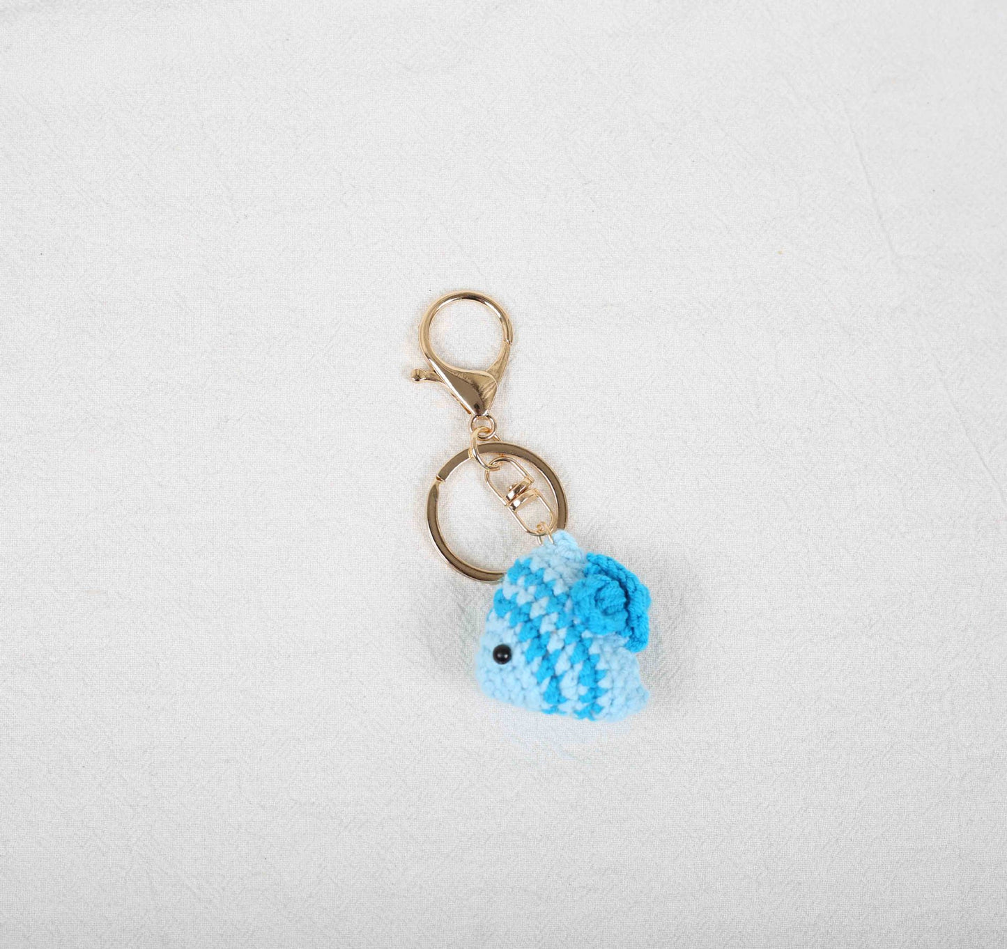 Blue crochet fish amigurumi DIY kit with adorable handmade fish plush toy