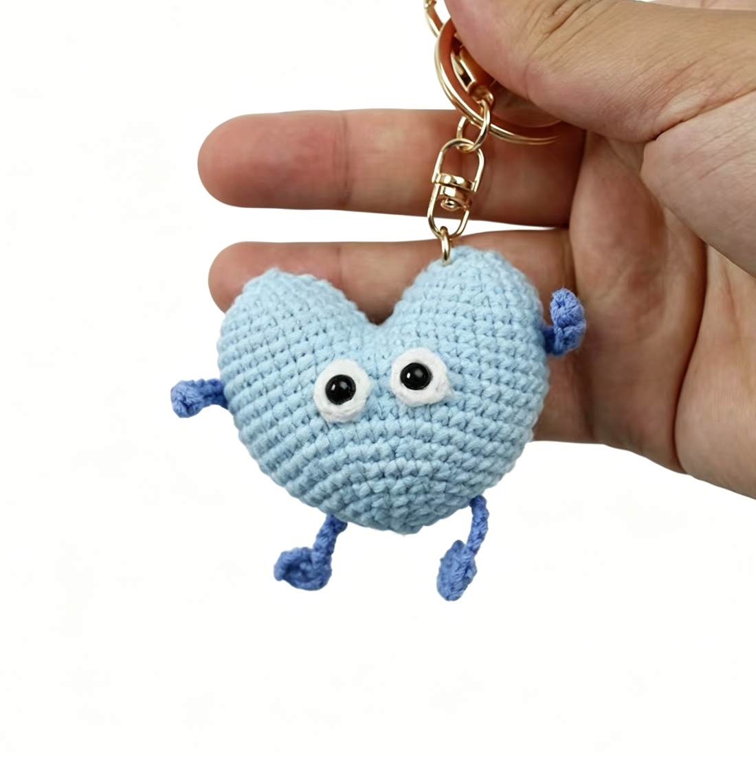 Blue crochet heart plush keychain handmade with soft yarn and cute amigurumi design