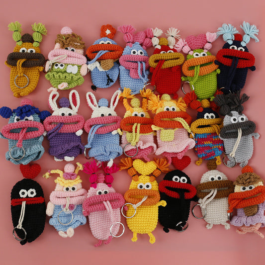 Cute crochet key cover with big mouth design and small arms and legs