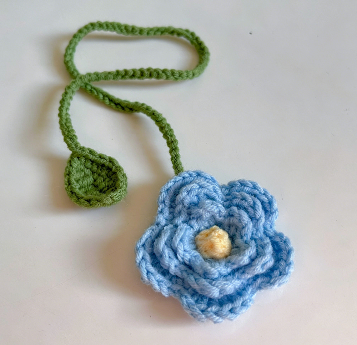 Handmade blue crochet flower bookmark for books and journals
