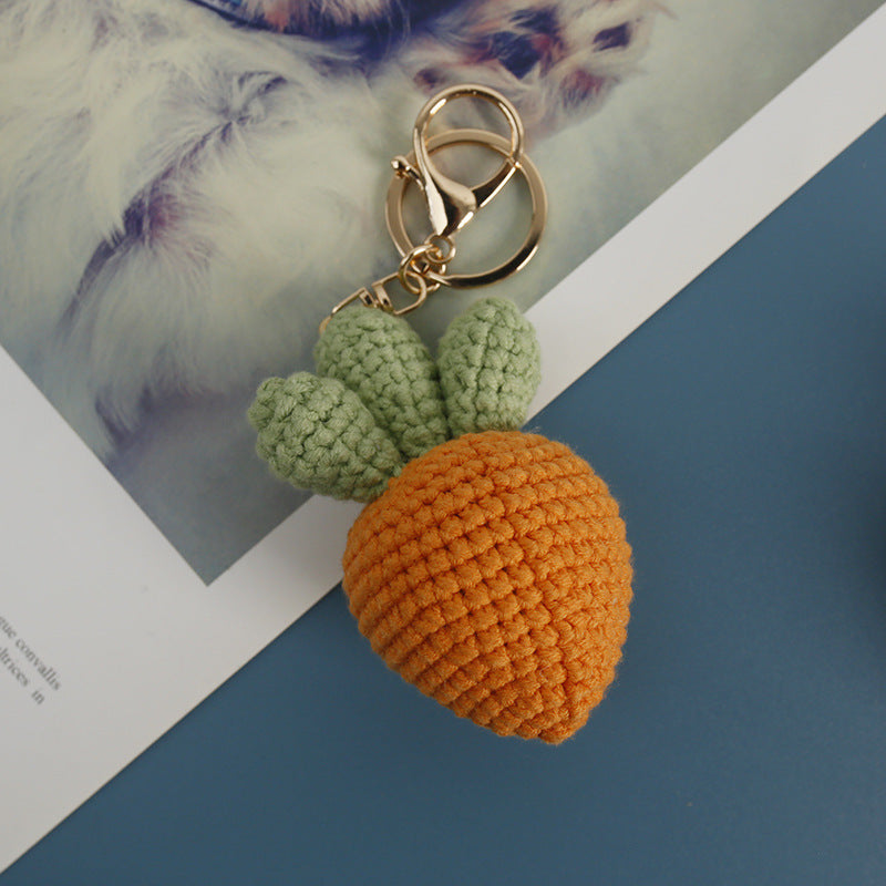 Cute crochet carrot keychain attached to a keyring
