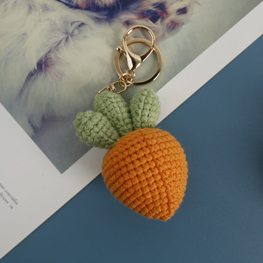 Cute crochet carrot keychain attached to a keyring