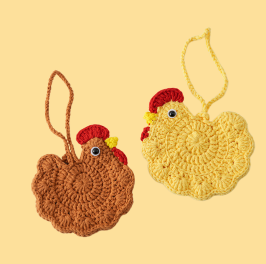 Yellow and brown crochet chick pouches finished with cute chick designs
