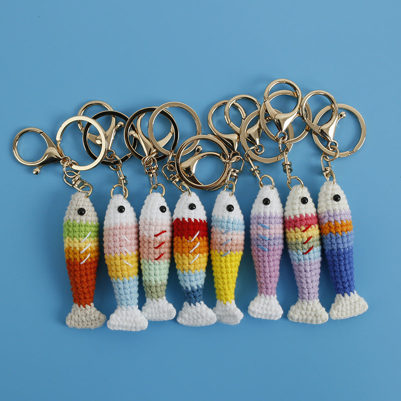 Handmade crochet fish plush keychains with metal keyrings displayed together