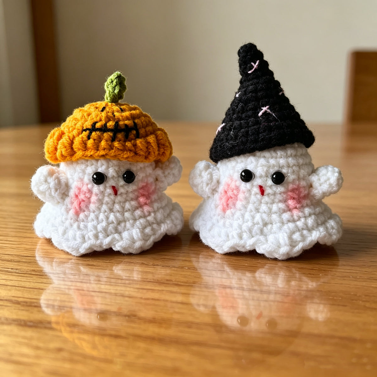 Crochet Halloween plush kit featuring cute pumpkin hat and witch hat designs