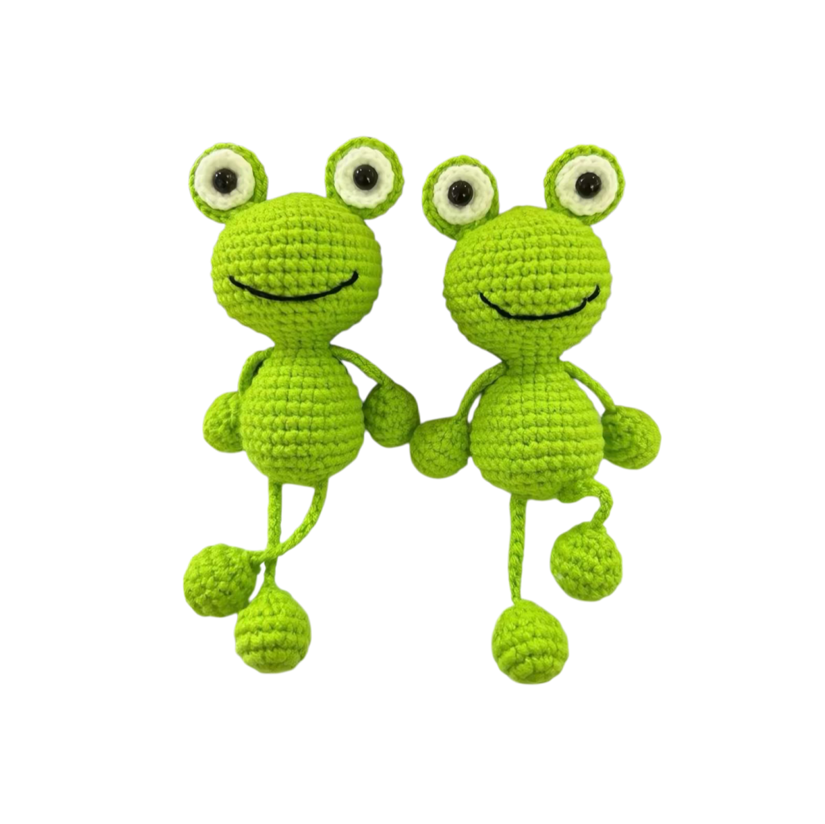 Close up detail of a crochet hanging frog keychain with handmade stitches and cute design