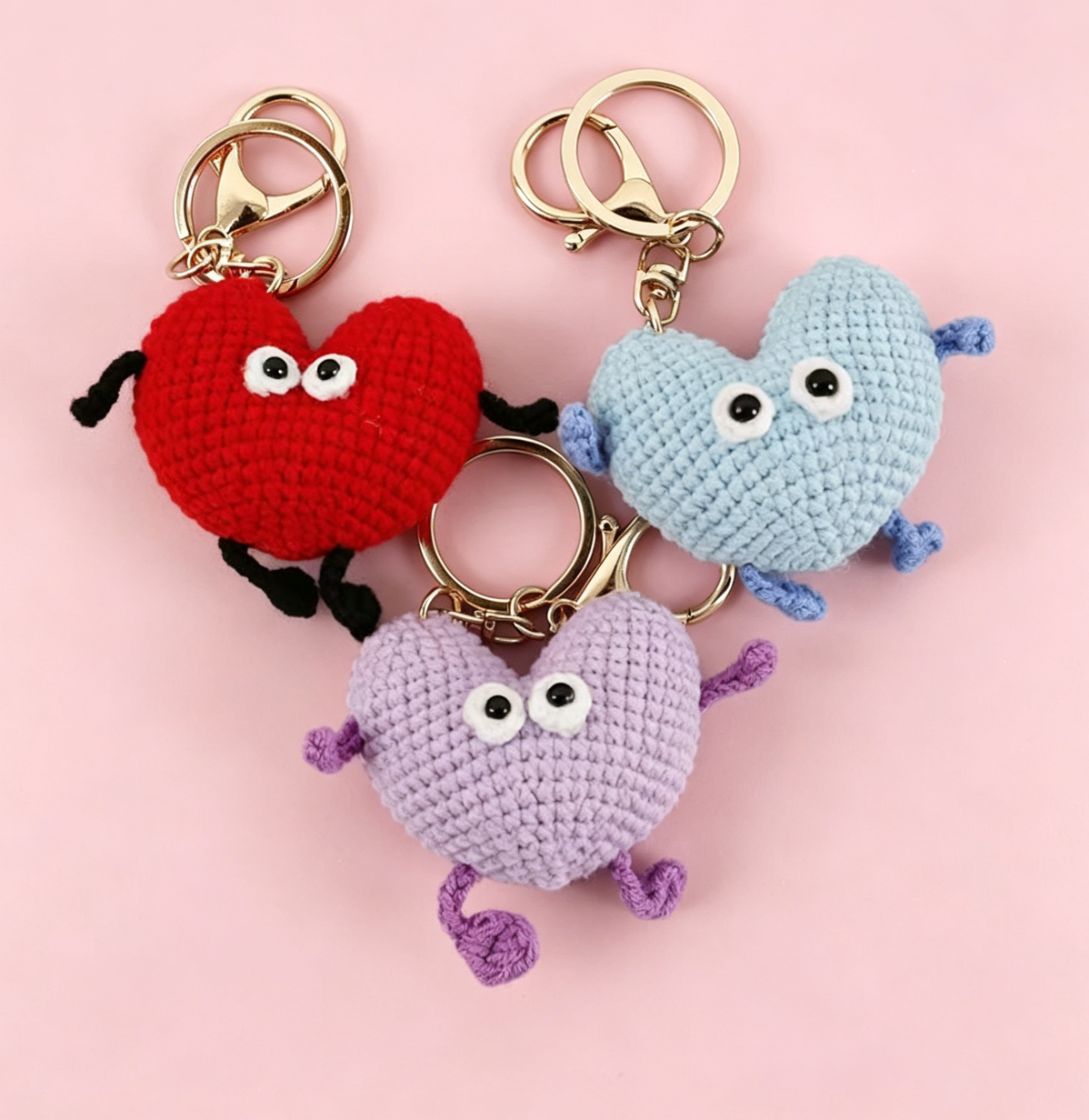 Crochet Heart Plush Kit featuring red, purple, and blue crochet heart keychains displayed together