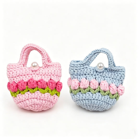 Crochet Mini Tulip Pouch Kit in pink and blue colors displayed together