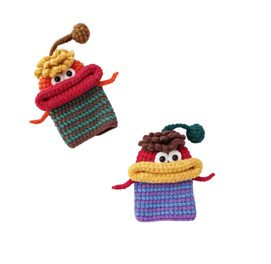 Cute crochet monster key cover kit in red and purple colors finished display