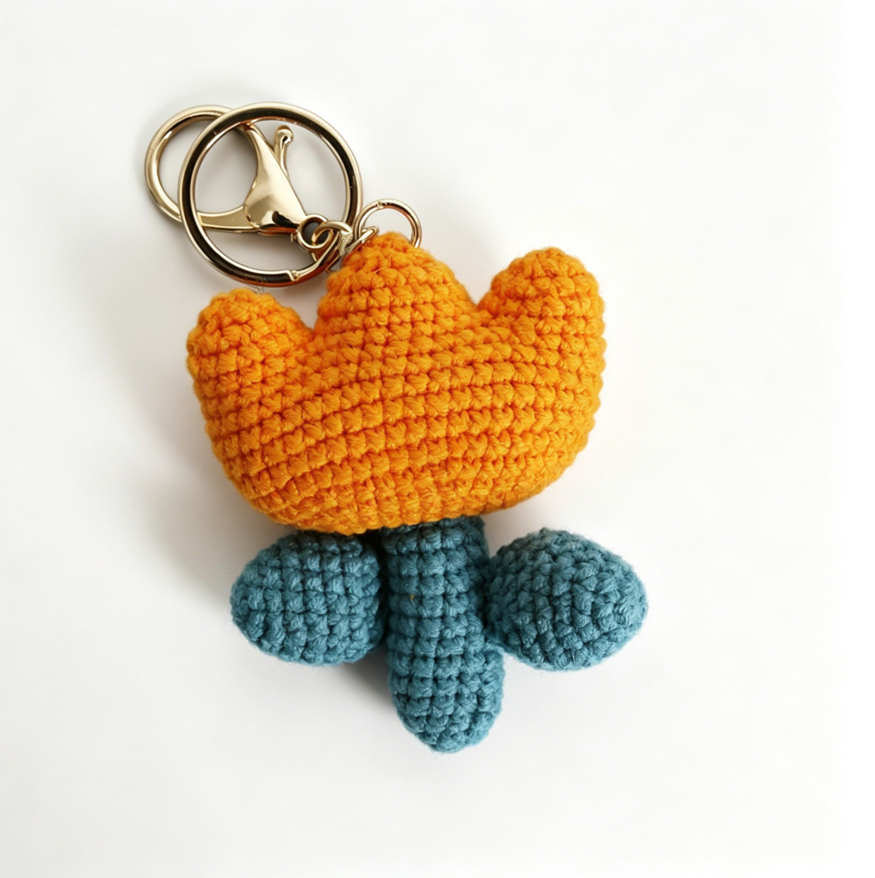 Orange crochet tulip keychain handmade from DIY crochet tulip kit