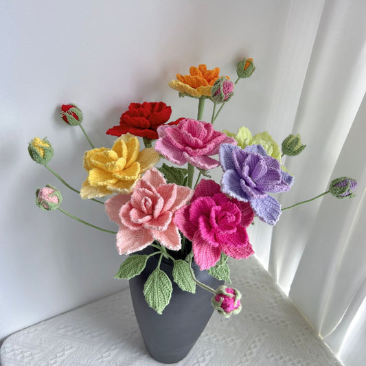 Handmade crochet rose bouquet showing all 7 colors, pink, purple, red, rose red, white, yellow, soft pink