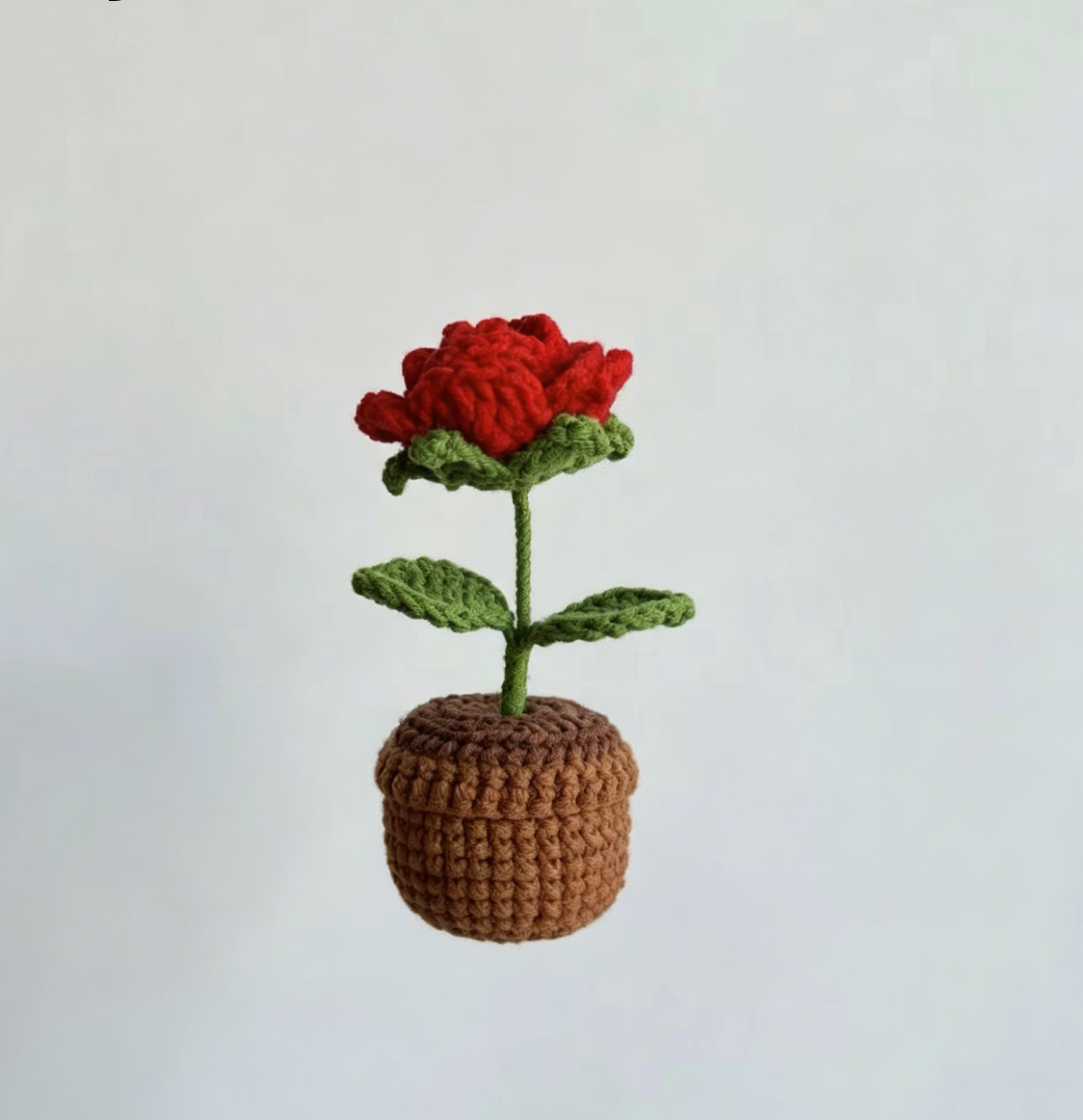 Beautiful rose crochet project made with the Crochet Mini Flower Kit for beginners
