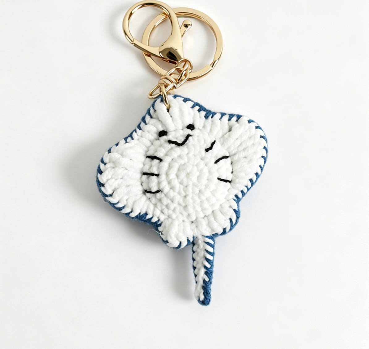 Blue crochet stingray keychain handmade with soft yarn and cute ocean animal design