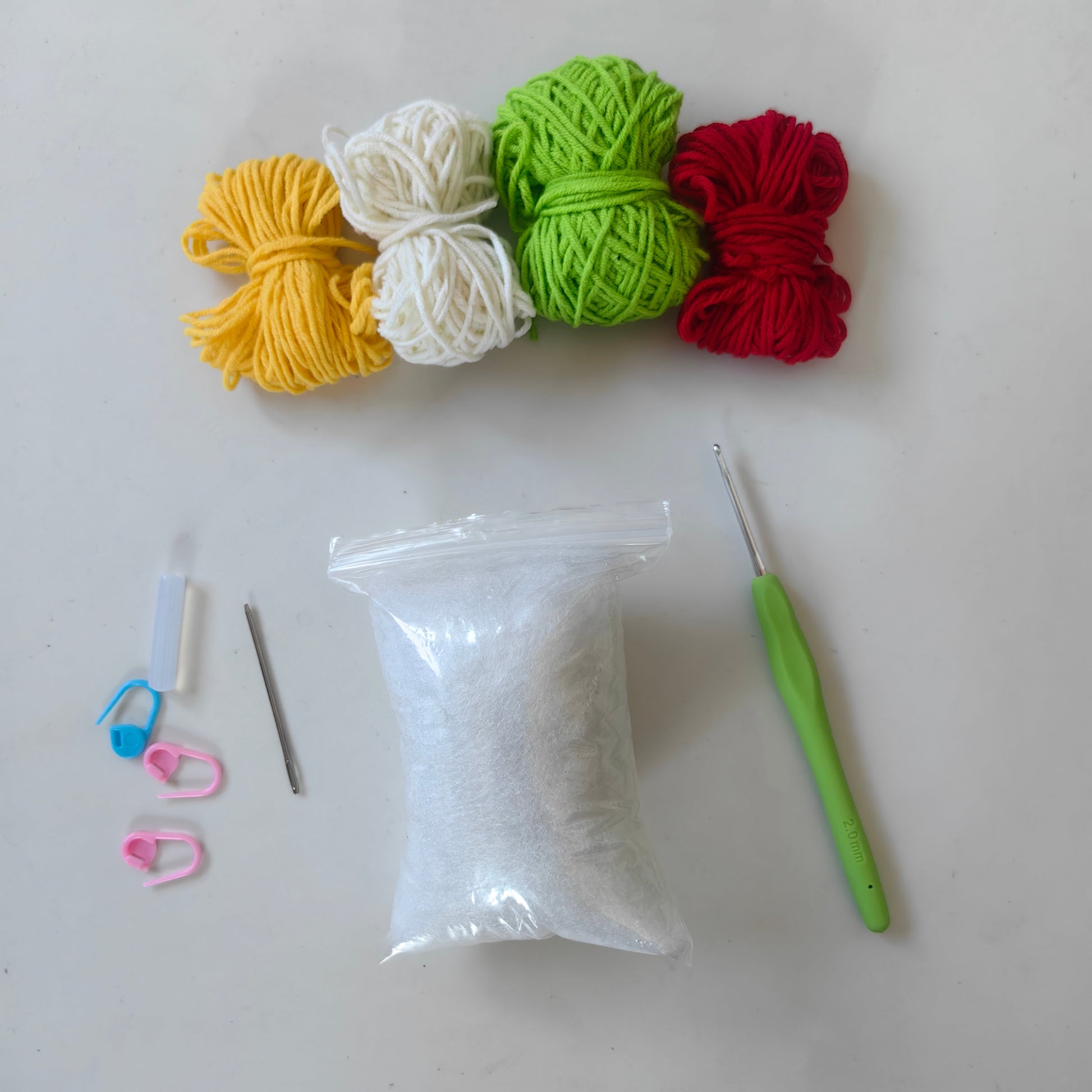 Complete Crochet Strawberry Kit with yarn, hook, stuffing and accessories