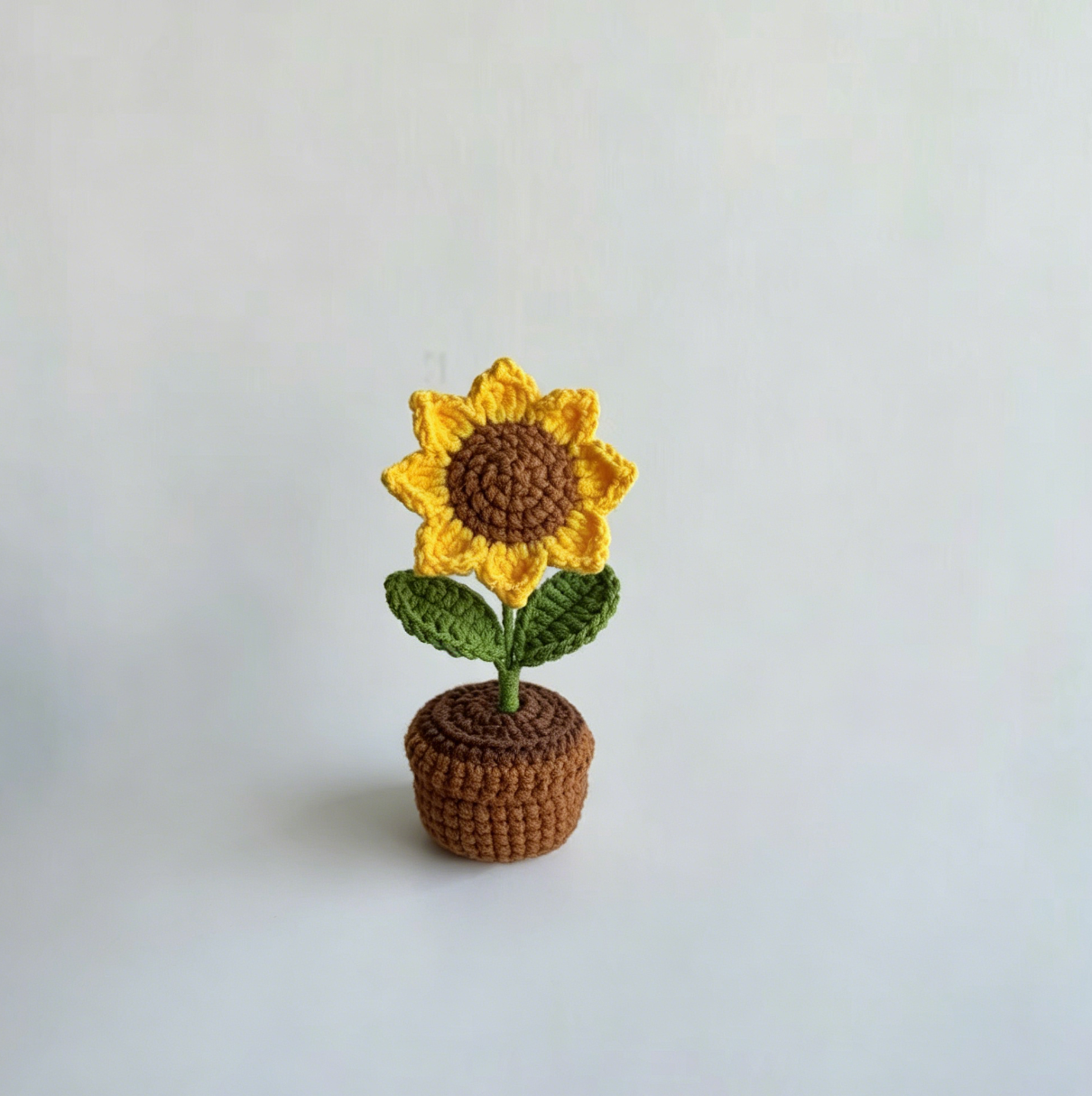 Adorable sunflower crochet project completed with the Crochet Mini Flower Kit.