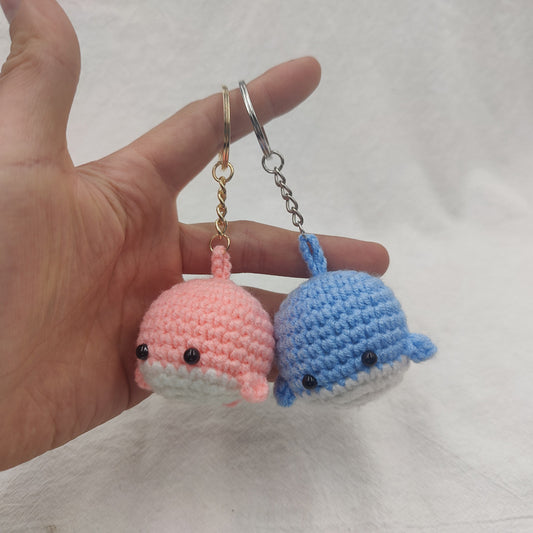 Cute crochet whale kit finished mini whales in pink and blue colors display