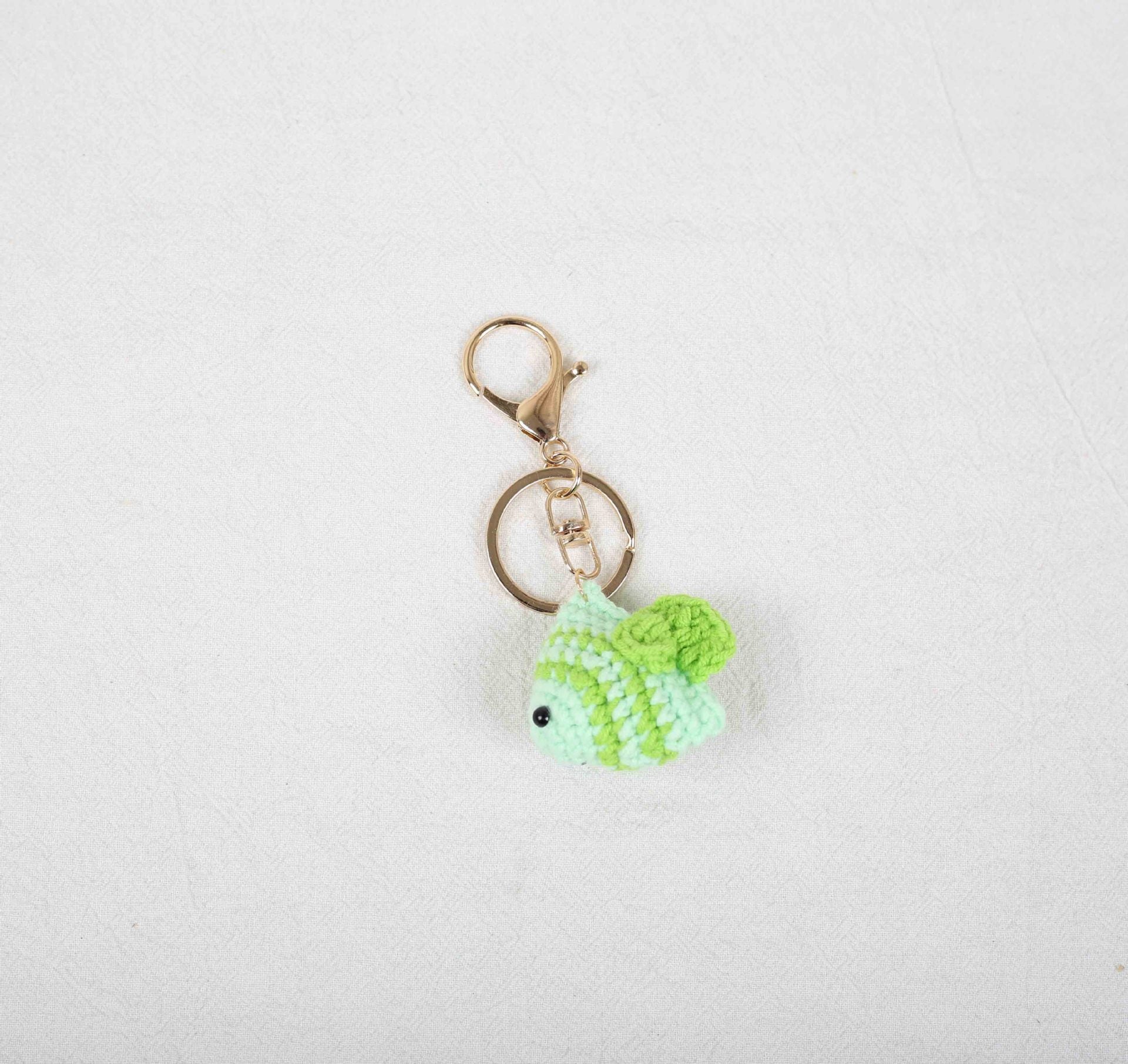 Green crochet fish amigurumi DIY kit with cute handmade fish plush design