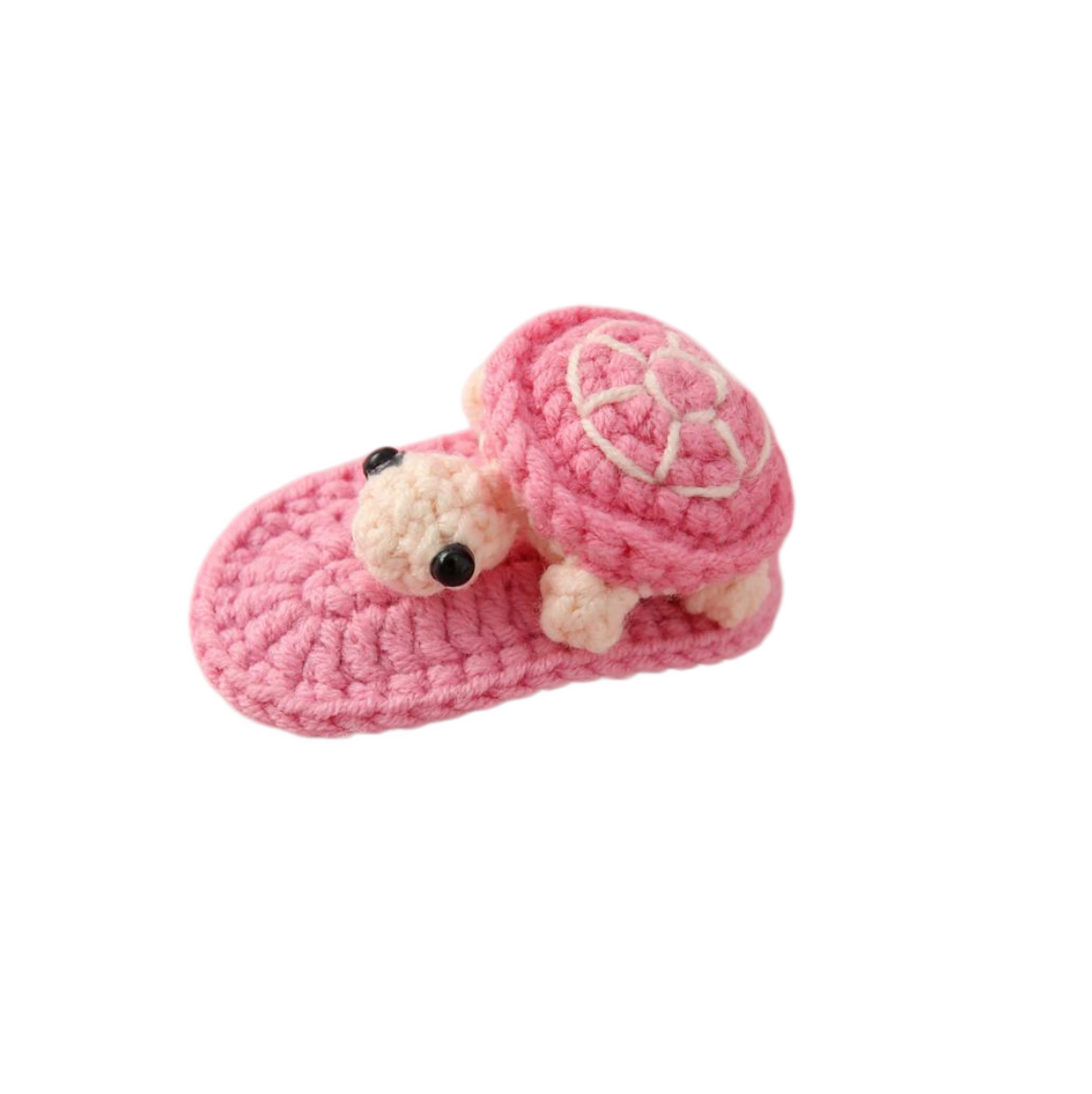 Cute pink crochet turtle hairpin handmade from soft yarn, perfect as a charming hair accessory and beginner crochet project.