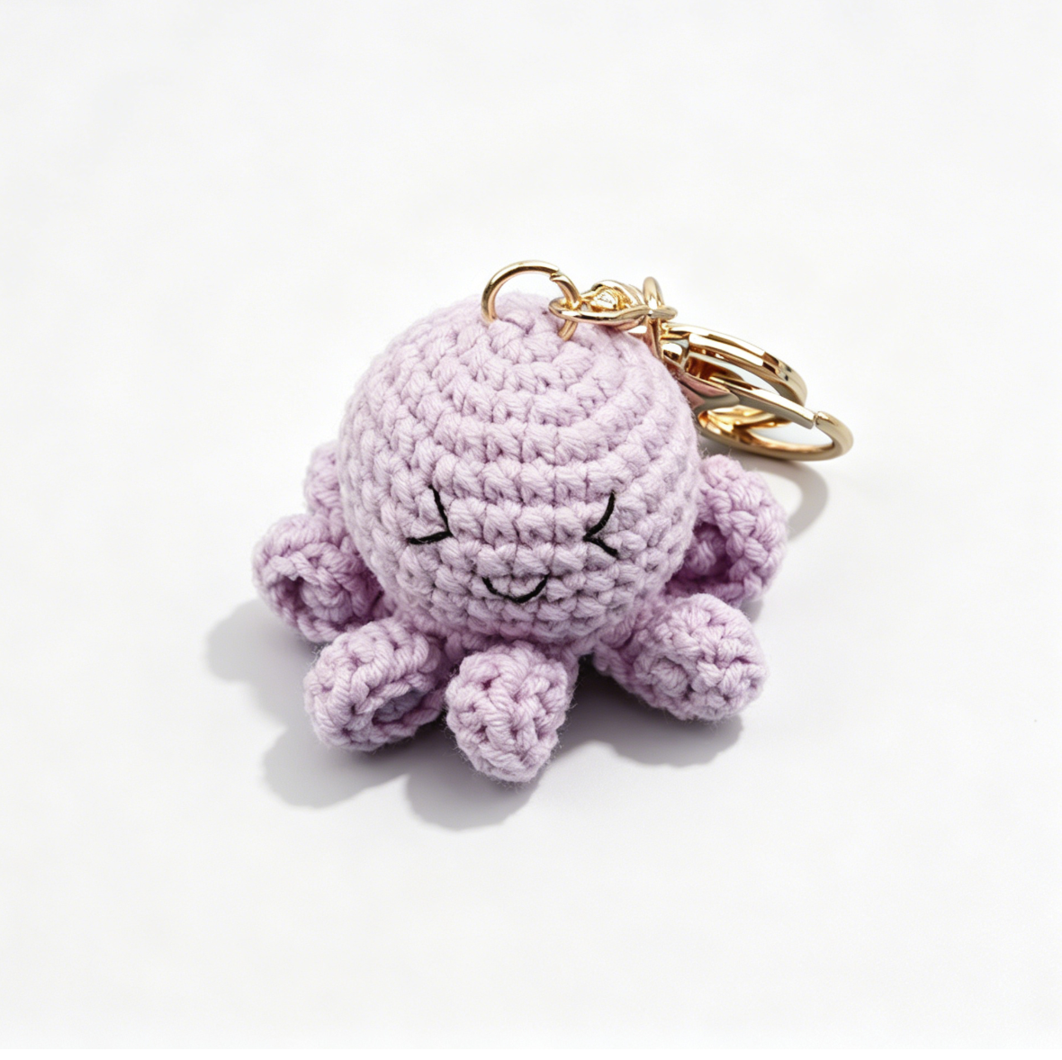 Cute purple crochet octopus keychain from the DIY crochet octopus kit